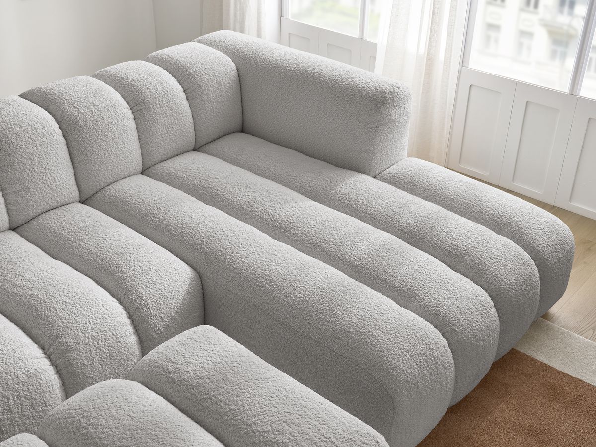 Canapé d'angle fixe TALIA tissu bouclette avec pouf