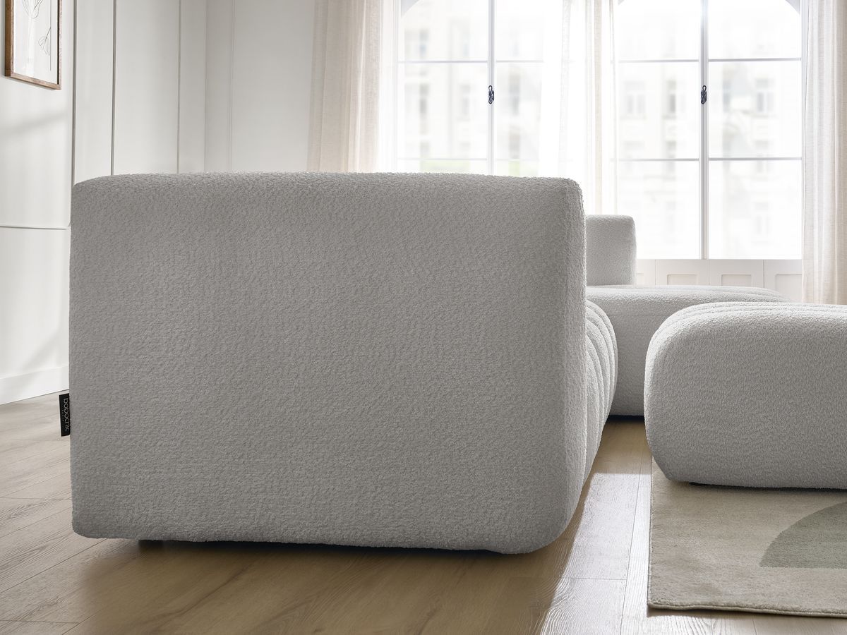 Canapé d'angle fixe TALIA tissu bouclette avec pouf