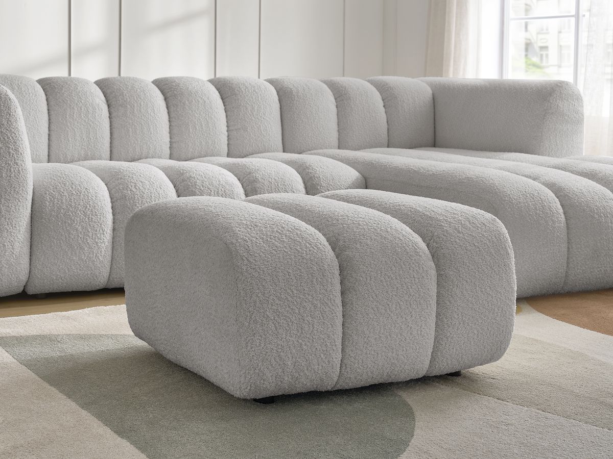 Canapé d'angle fixe TALIA tissu bouclette avec pouf