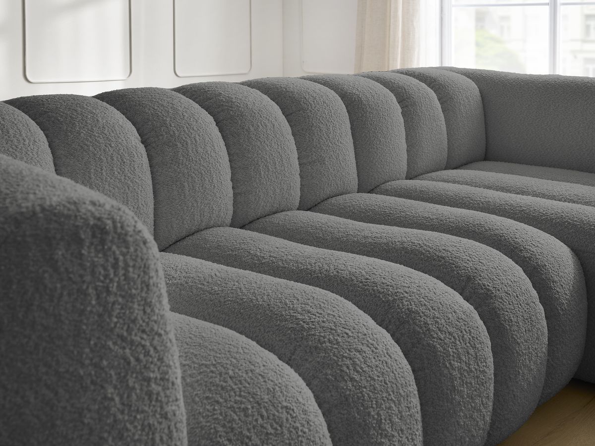 Canapé d'angle fixe TALIA tissu bouclette avec pouf