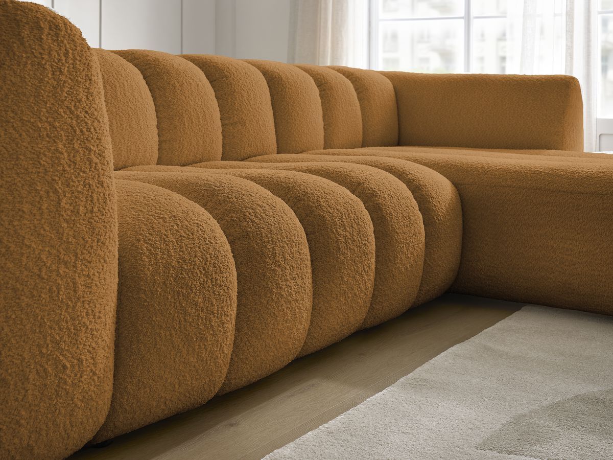 Canapé d'angle fixe TALIA tissu bouclette avec pouf