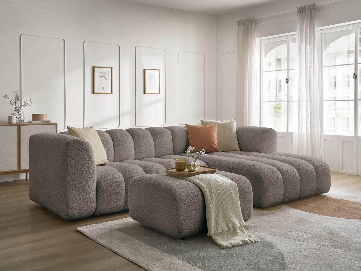 Canapé d'angle fixe TALIA tissu bouclette avec pouf
