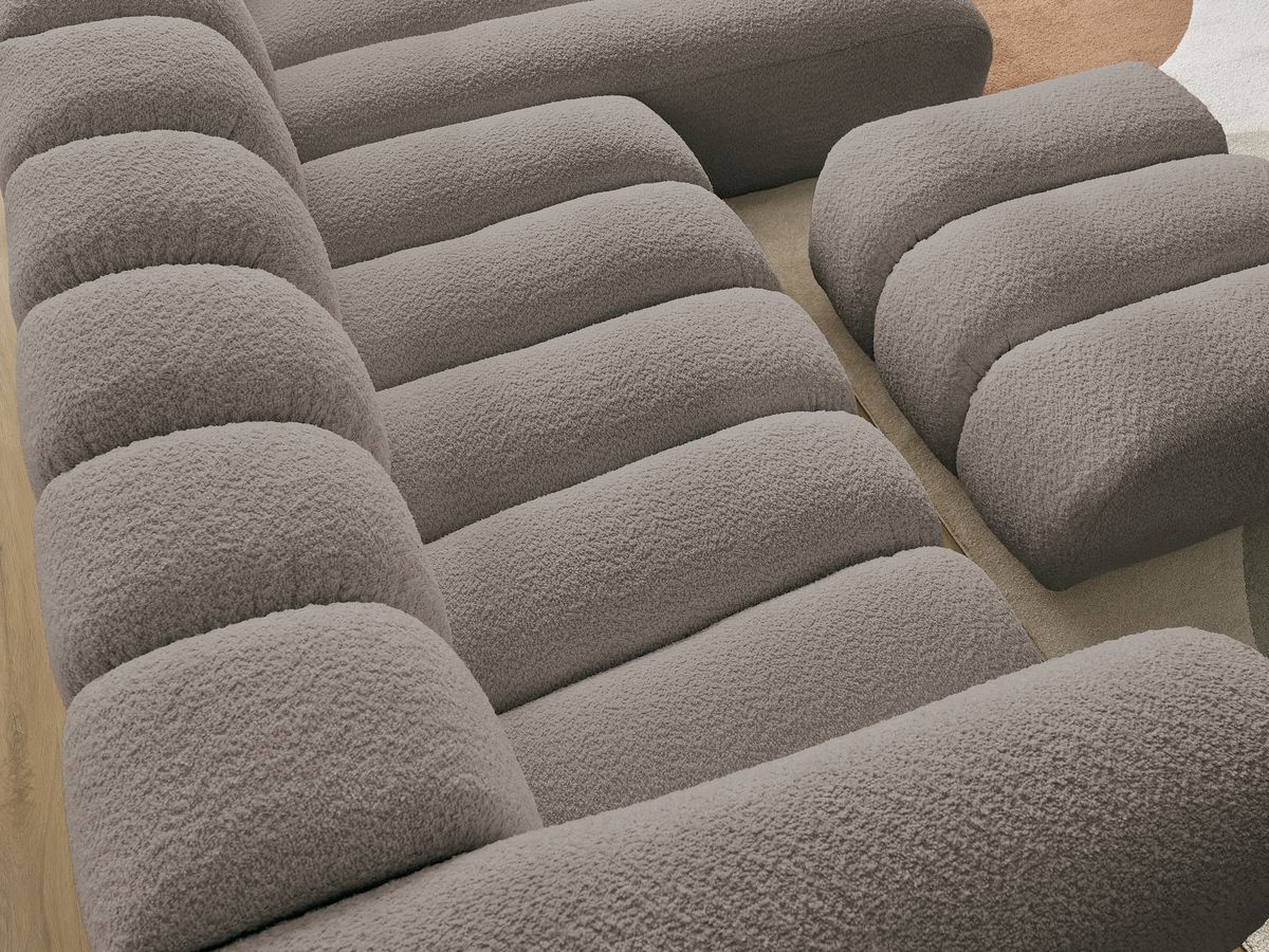 Canapé d'angle fixe TALIA tissu bouclette avec pouf