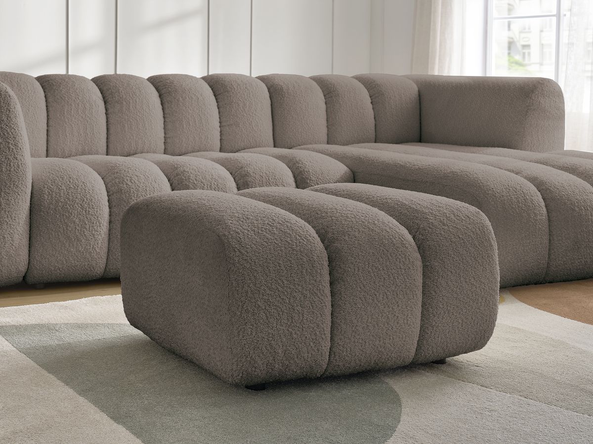 Canapé d'angle fixe TALIA tissu bouclette avec pouf