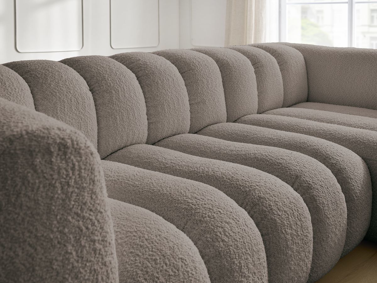 Canapé d'angle fixe TALIA tissu bouclette avec pouf