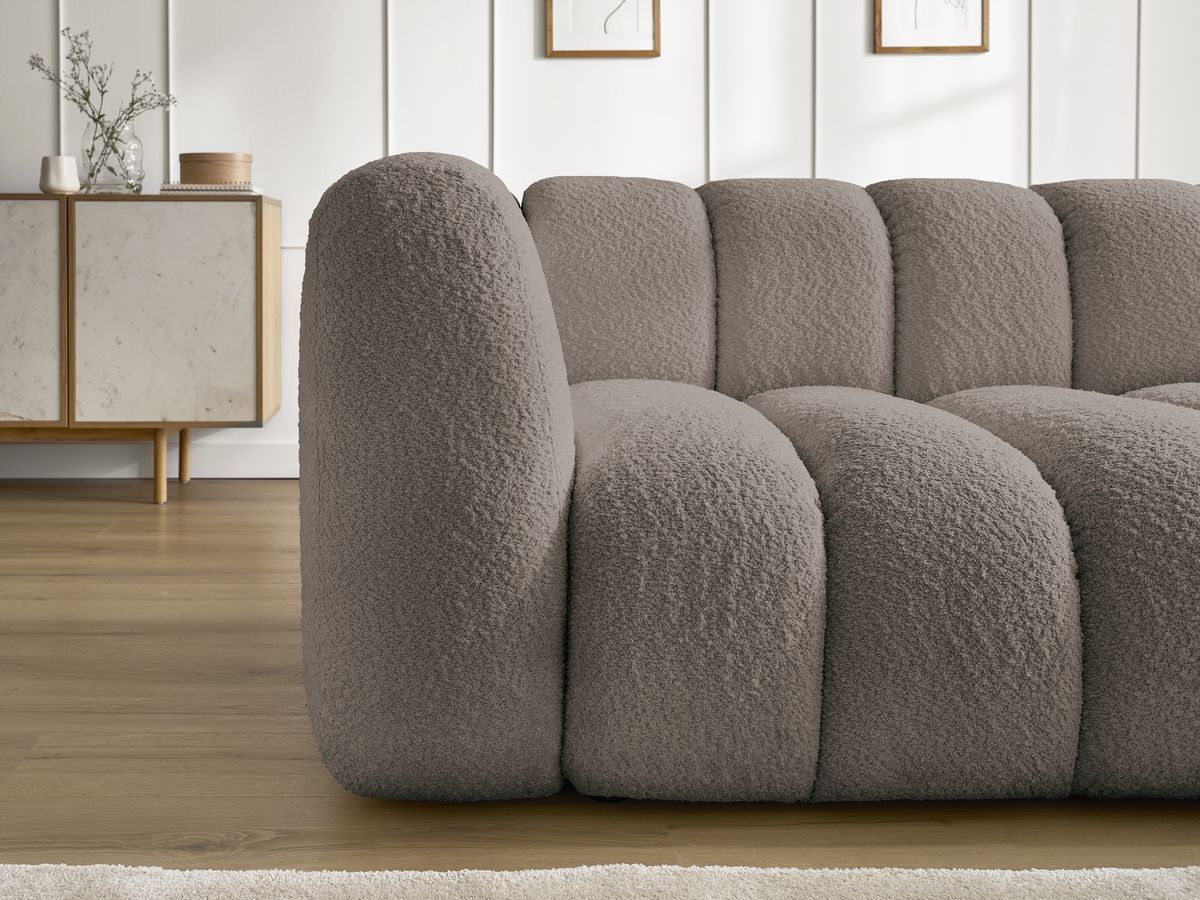 Canapé d'angle fixe TALIA tissu bouclette avec pouf