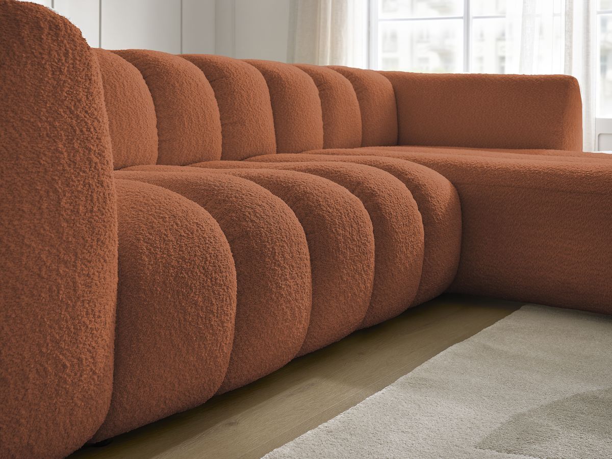 Canapé d'angle fixe TALIA tissu bouclette avec pouf