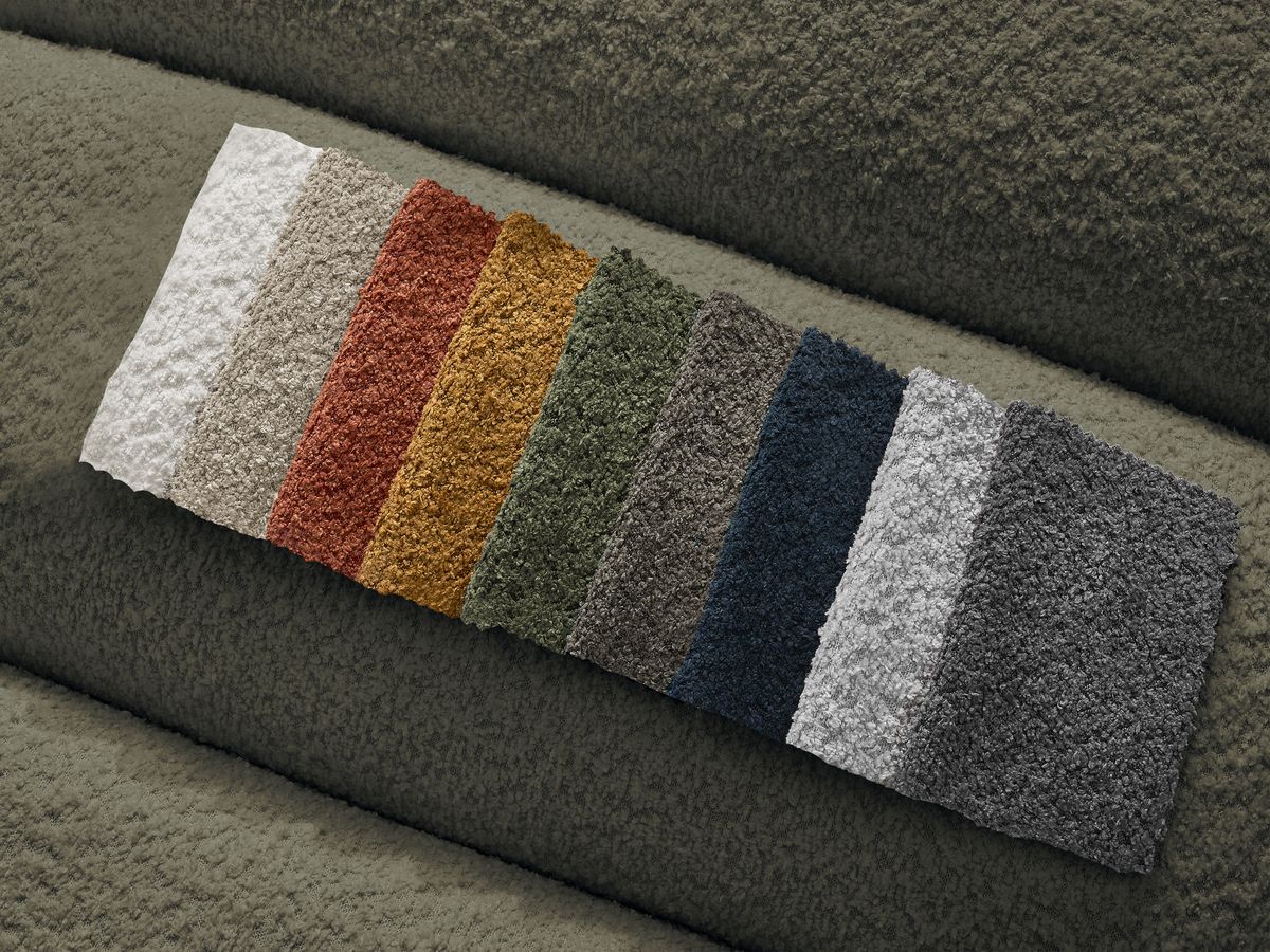 Canapé d'angle fixe TALIA tissu bouclette avec pouf