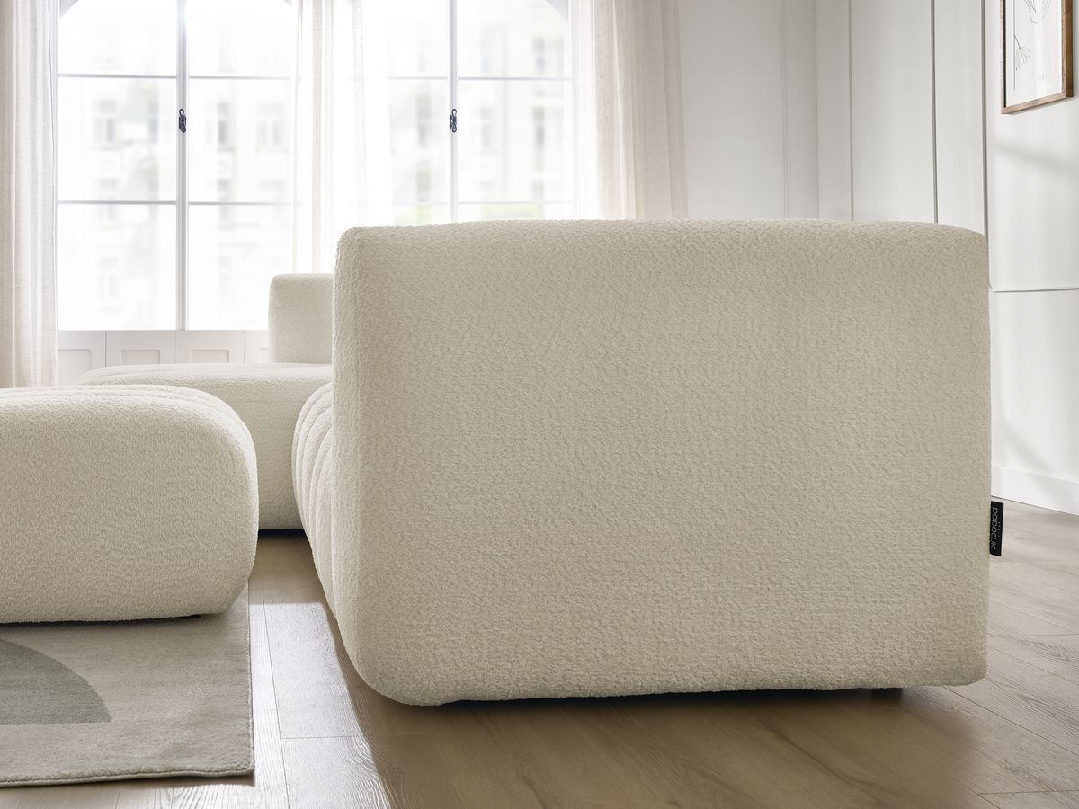 Canapé d'angle fixe TALIA tissu bouclette avec pouf