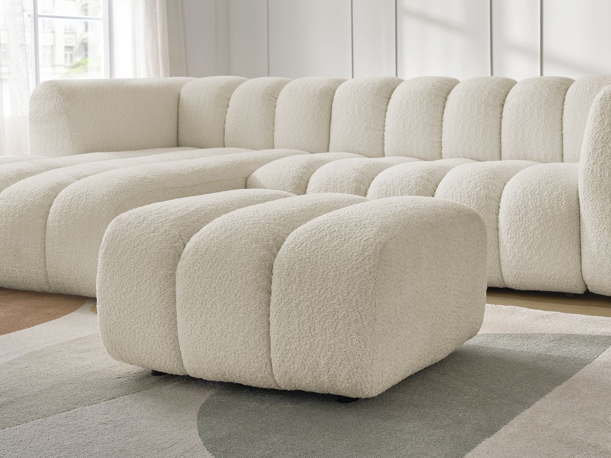 Canapé d'angle fixe TALIA tissu bouclette avec pouf