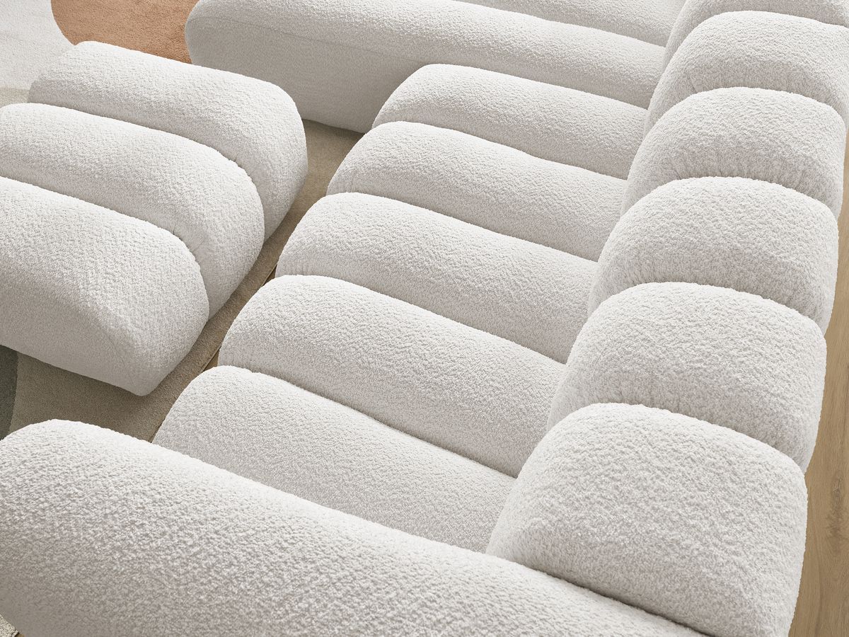 Canapé d'angle fixe TALIA tissu bouclette avec pouf