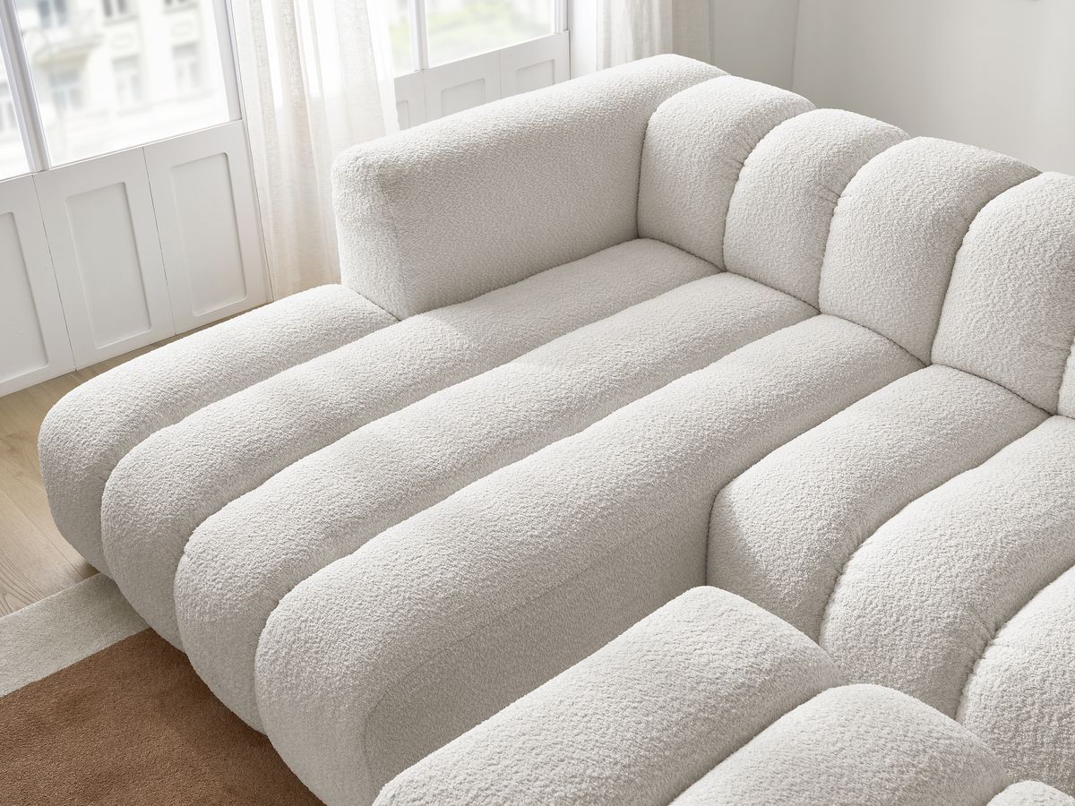 Canapé d'angle fixe TALIA tissu bouclette avec pouf
