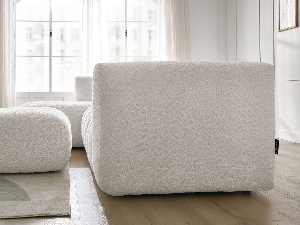Canapé d'angle fixe TALIA tissu bouclette avec pouf
