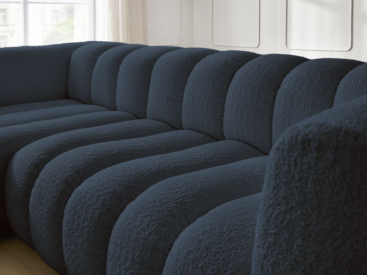 Canapé d'angle fixe TALIA tissu bouclette avec pouf