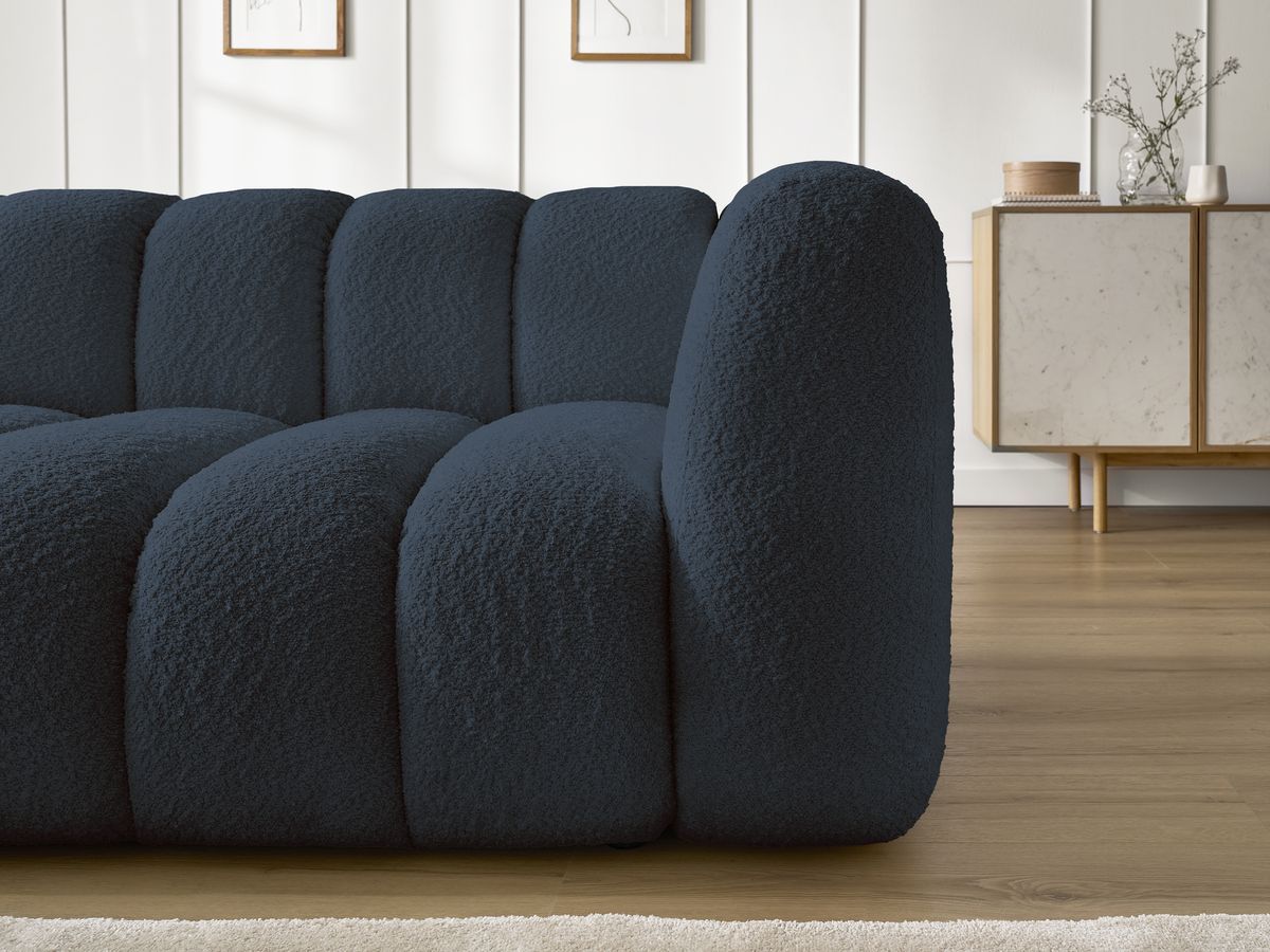 Canapé d'angle fixe TALIA tissu bouclette avec pouf