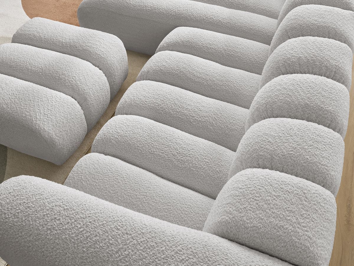 Canapé d'angle fixe TALIA tissu bouclette avec pouf
