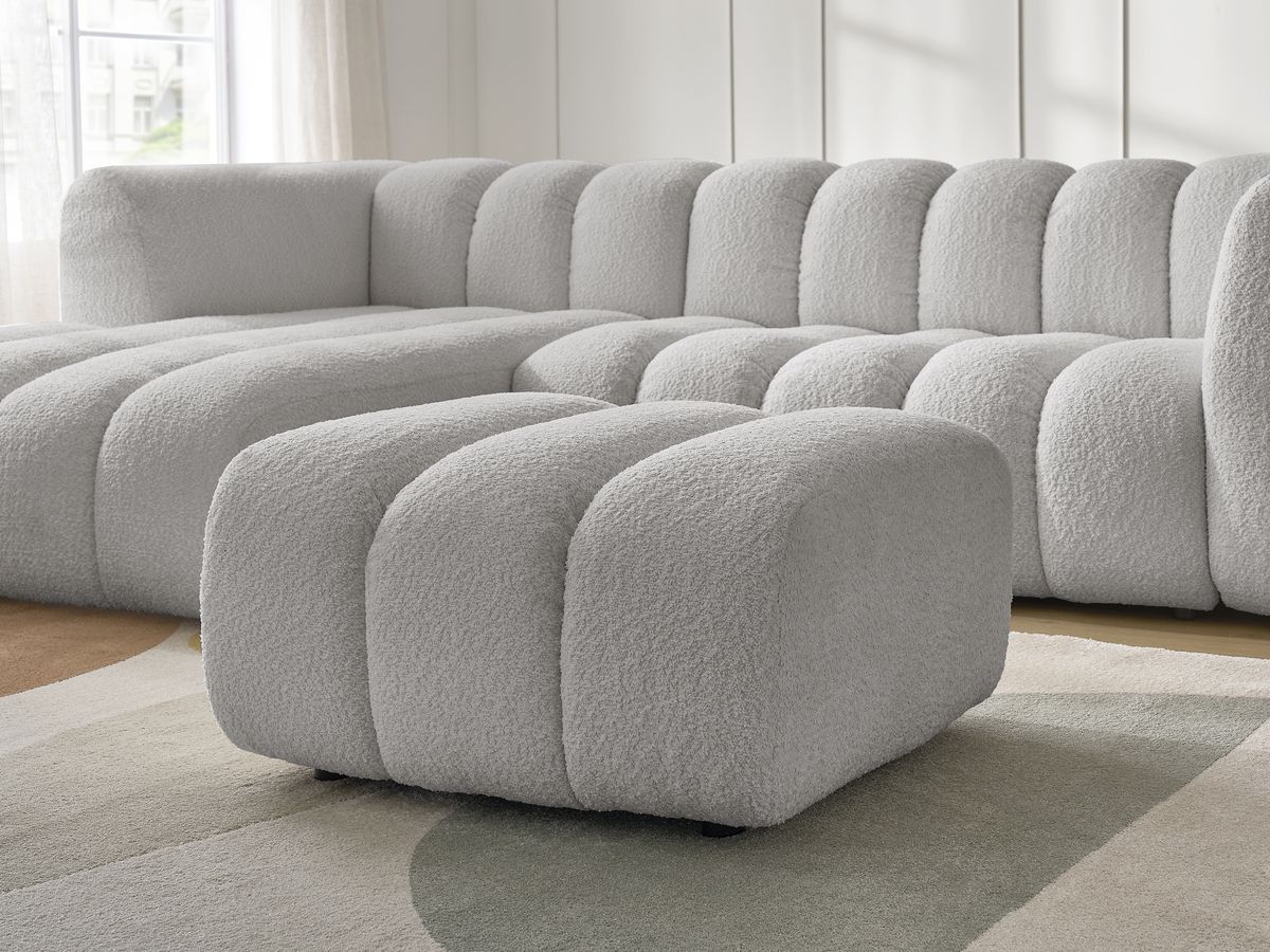 Canapé d'angle fixe TALIA tissu bouclette avec pouf