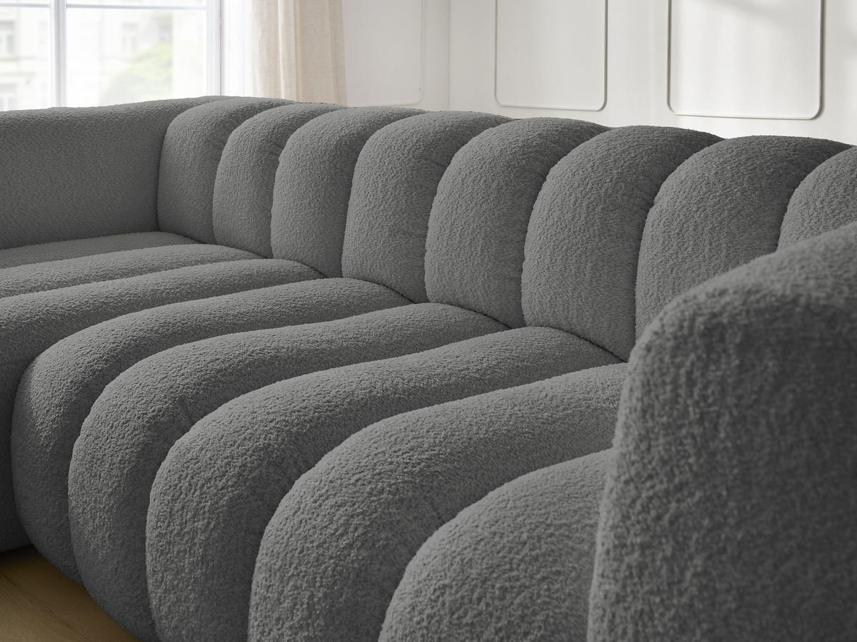 Canapé d'angle fixe TALIA tissu bouclette avec pouf