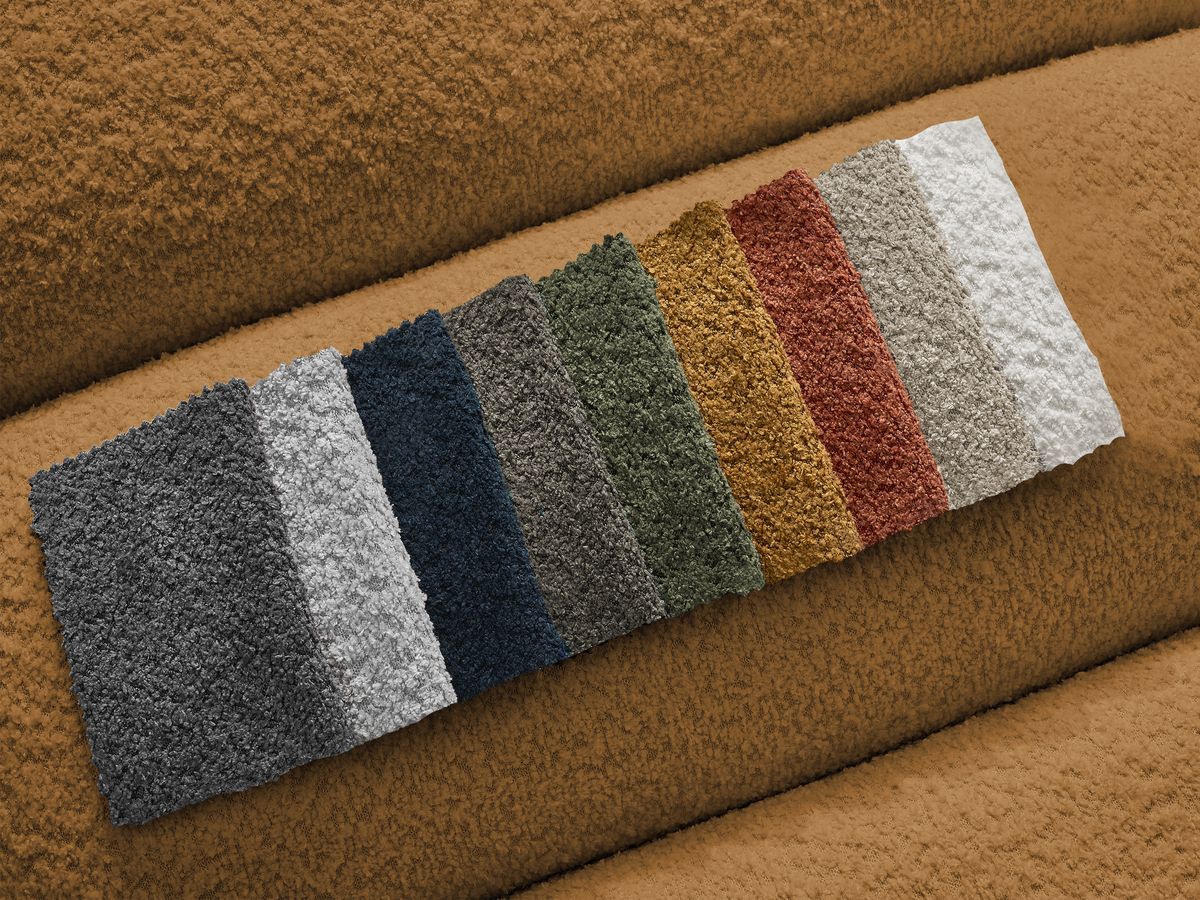 Canapé d'angle fixe TALIA tissu bouclette avec pouf