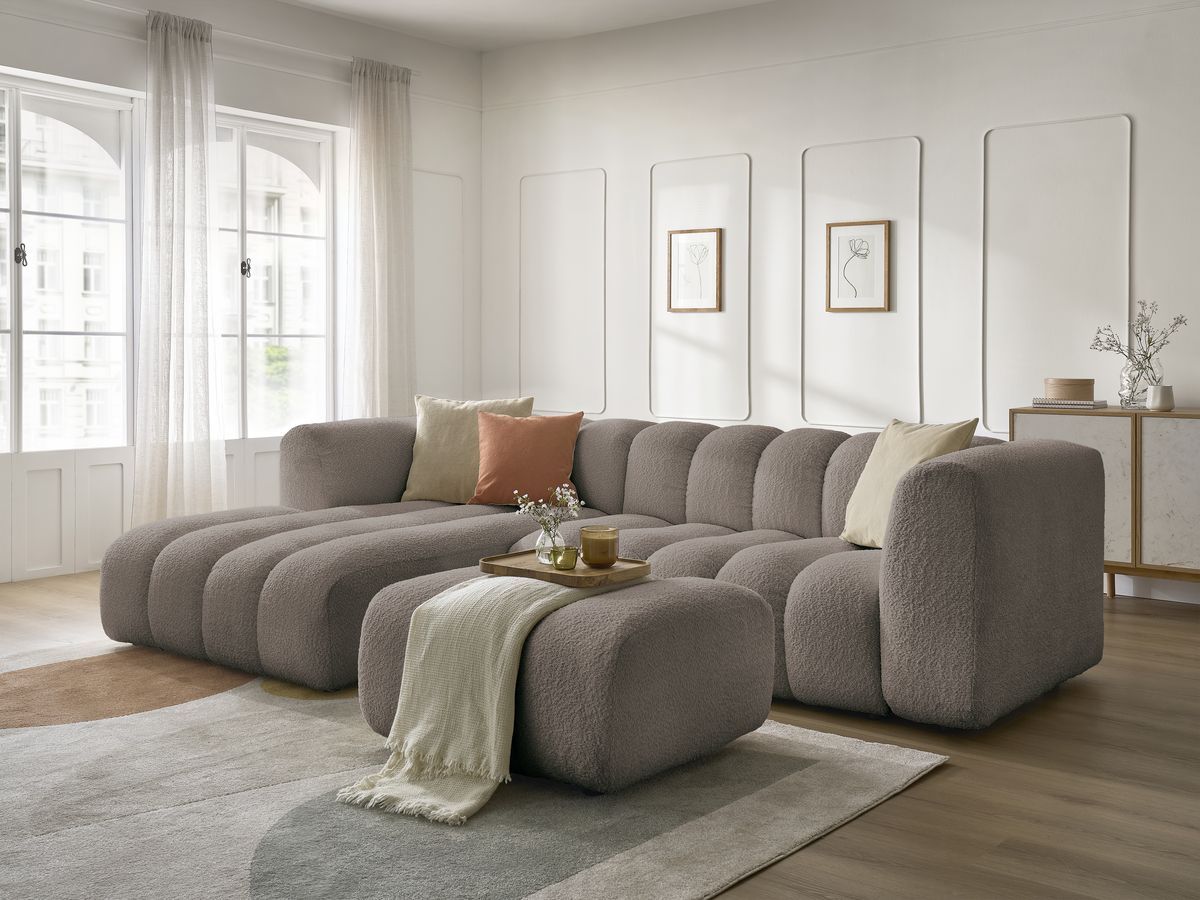 Canapé d'angle fixe TALIA tissu bouclette avec pouf