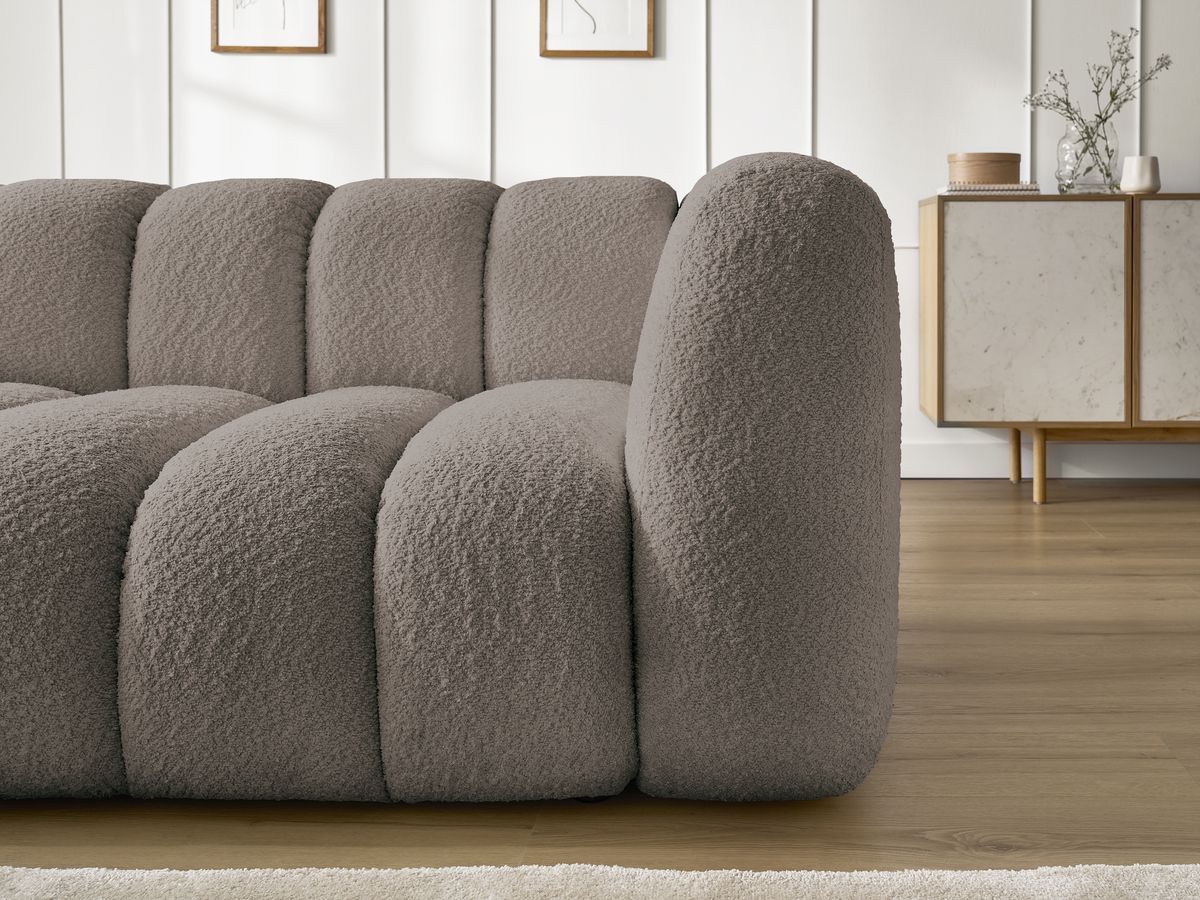Canapé d'angle fixe TALIA tissu bouclette avec pouf