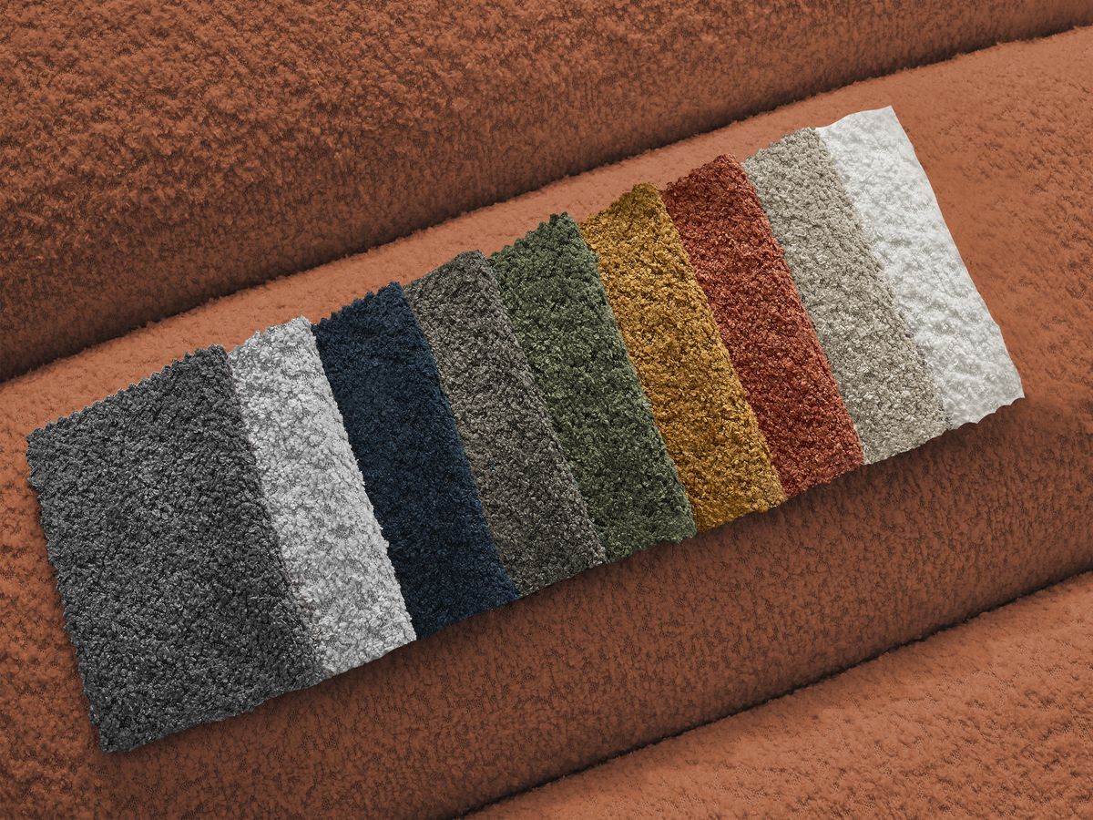 Canapé d'angle fixe TALIA tissu bouclette avec pouf