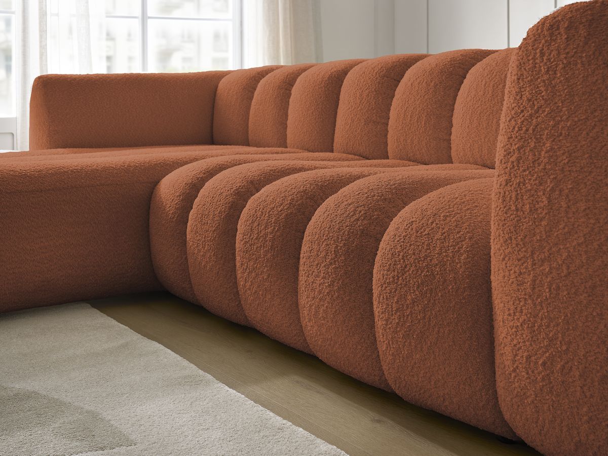 Canapé d'angle fixe TALIA tissu bouclette avec pouf