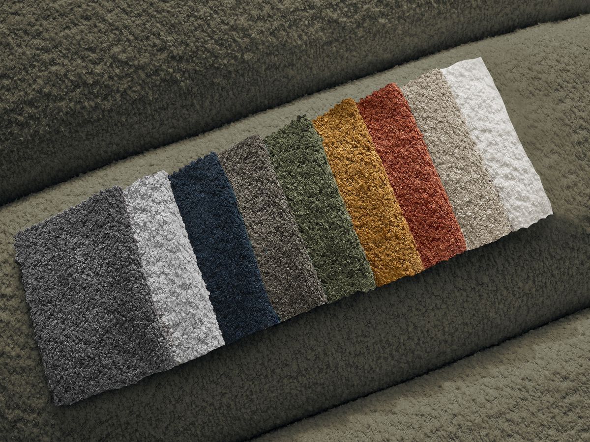 Canapé d'angle fixe TALIA tissu bouclette avec pouf