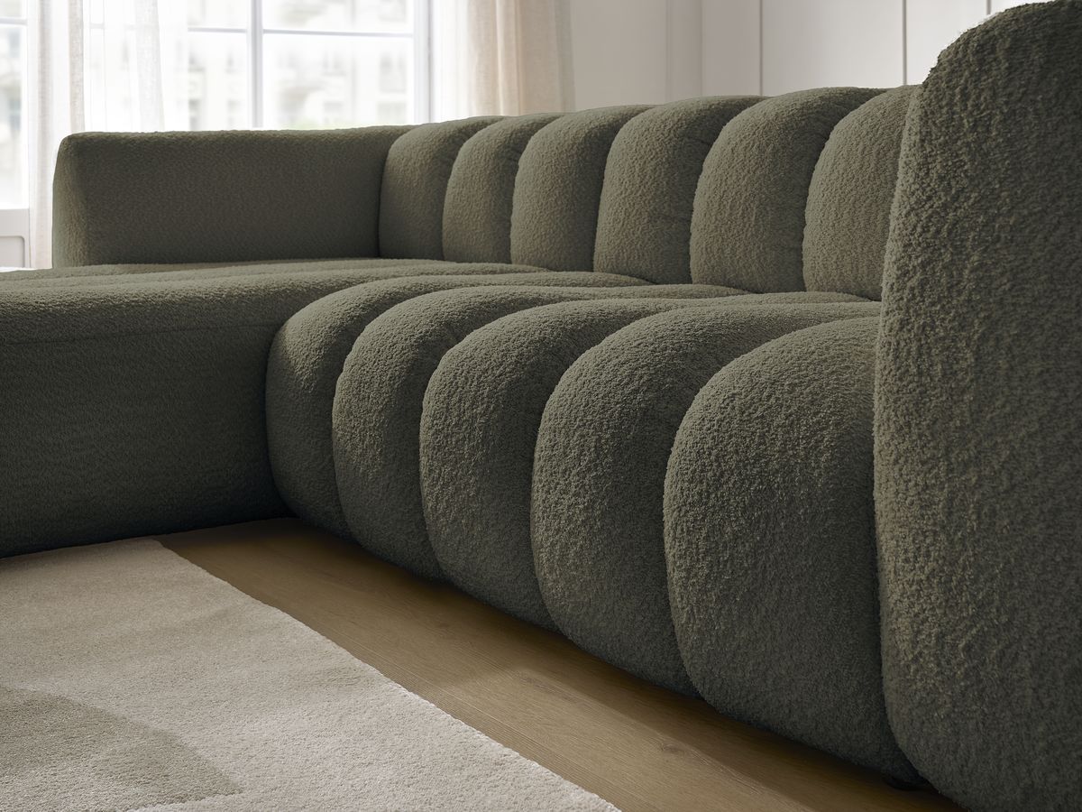 Canapé d'angle fixe TALIA tissu bouclette avec pouf