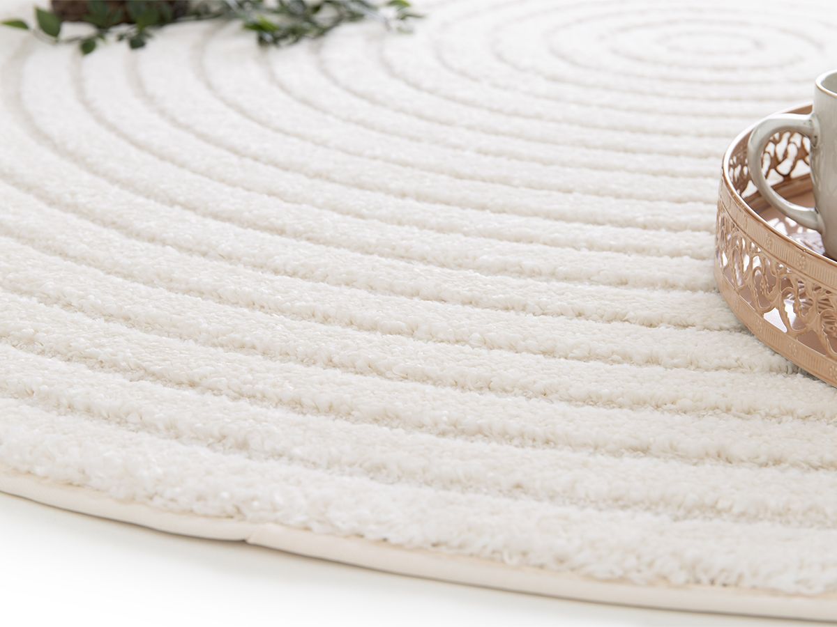 Tapis rond poils ras ONDELIA motif géométrique