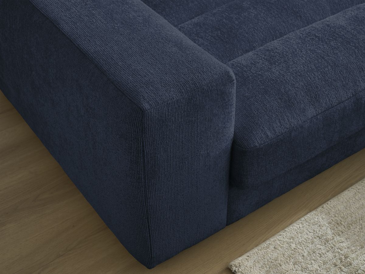 Canapé d'angle fixe SIERRA tissu texturé avec pouf