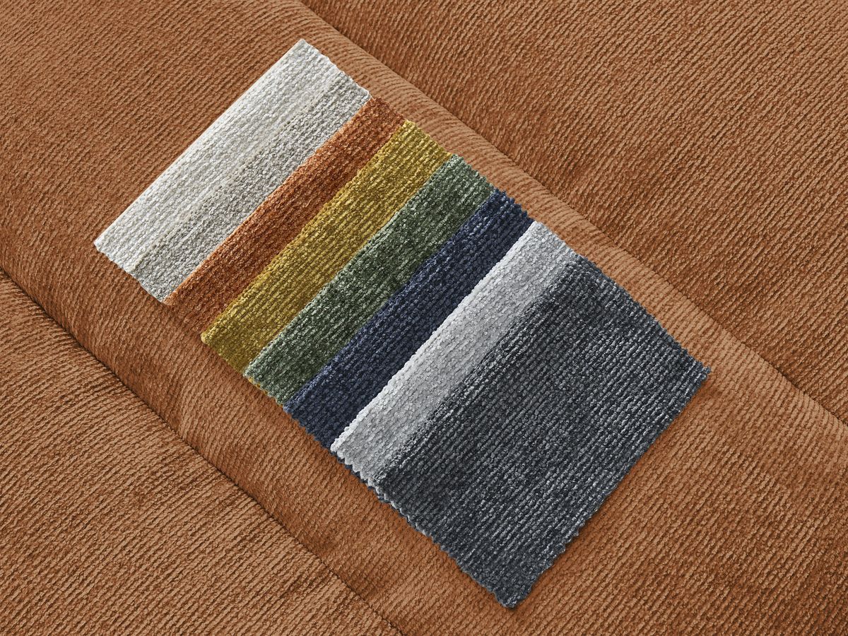 Canapé d'angle fixe SIERRA tissu texturé avec pouf