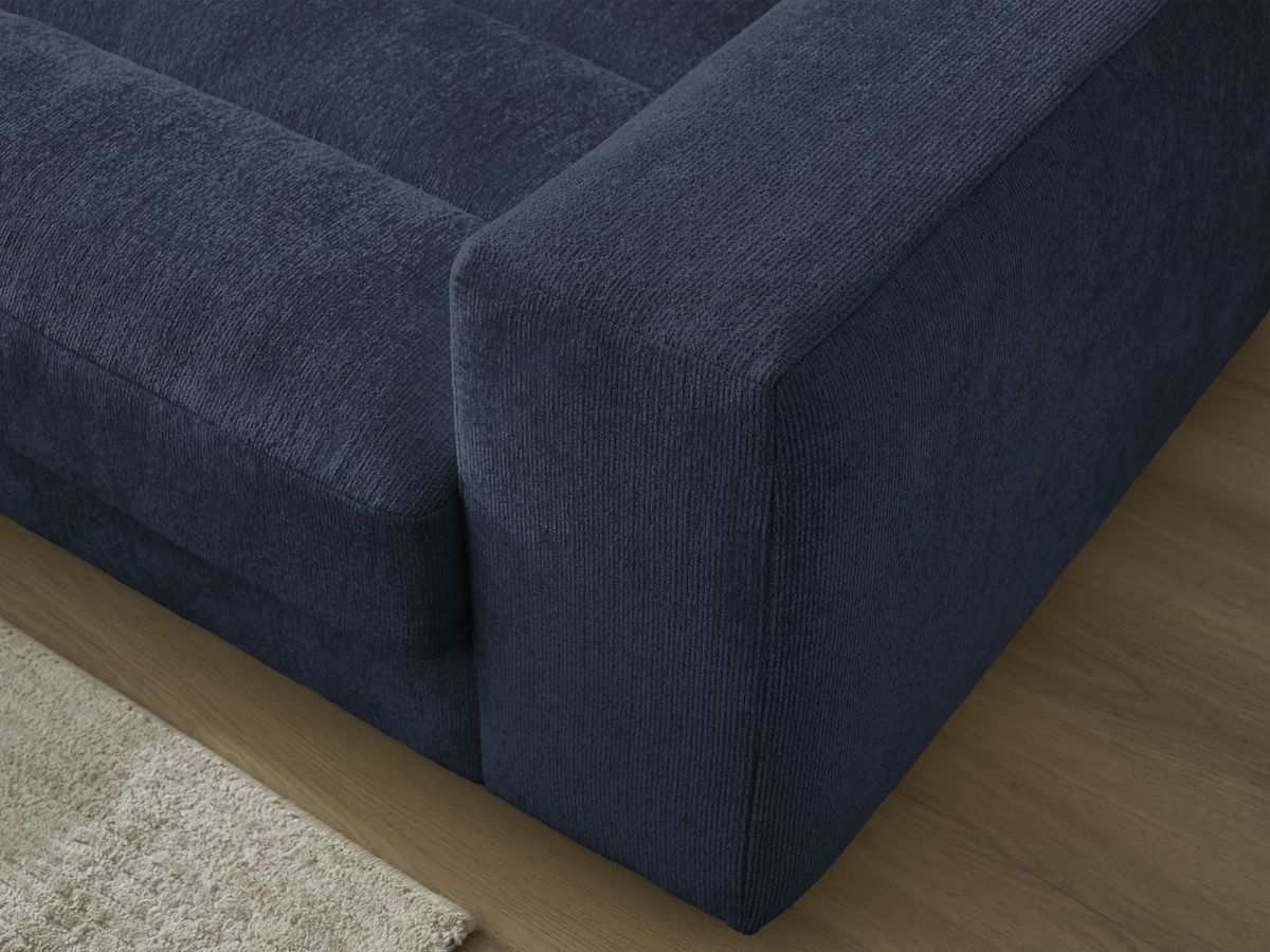 Canapé d'angle fixe SIERRA tissu texturé avec pouf