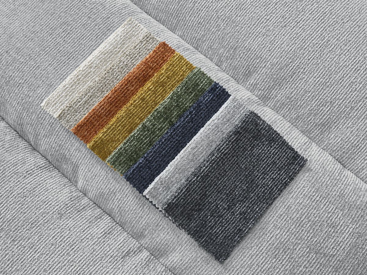 Canapé d'angle fixe SIERRA tissu texturé avec pouf