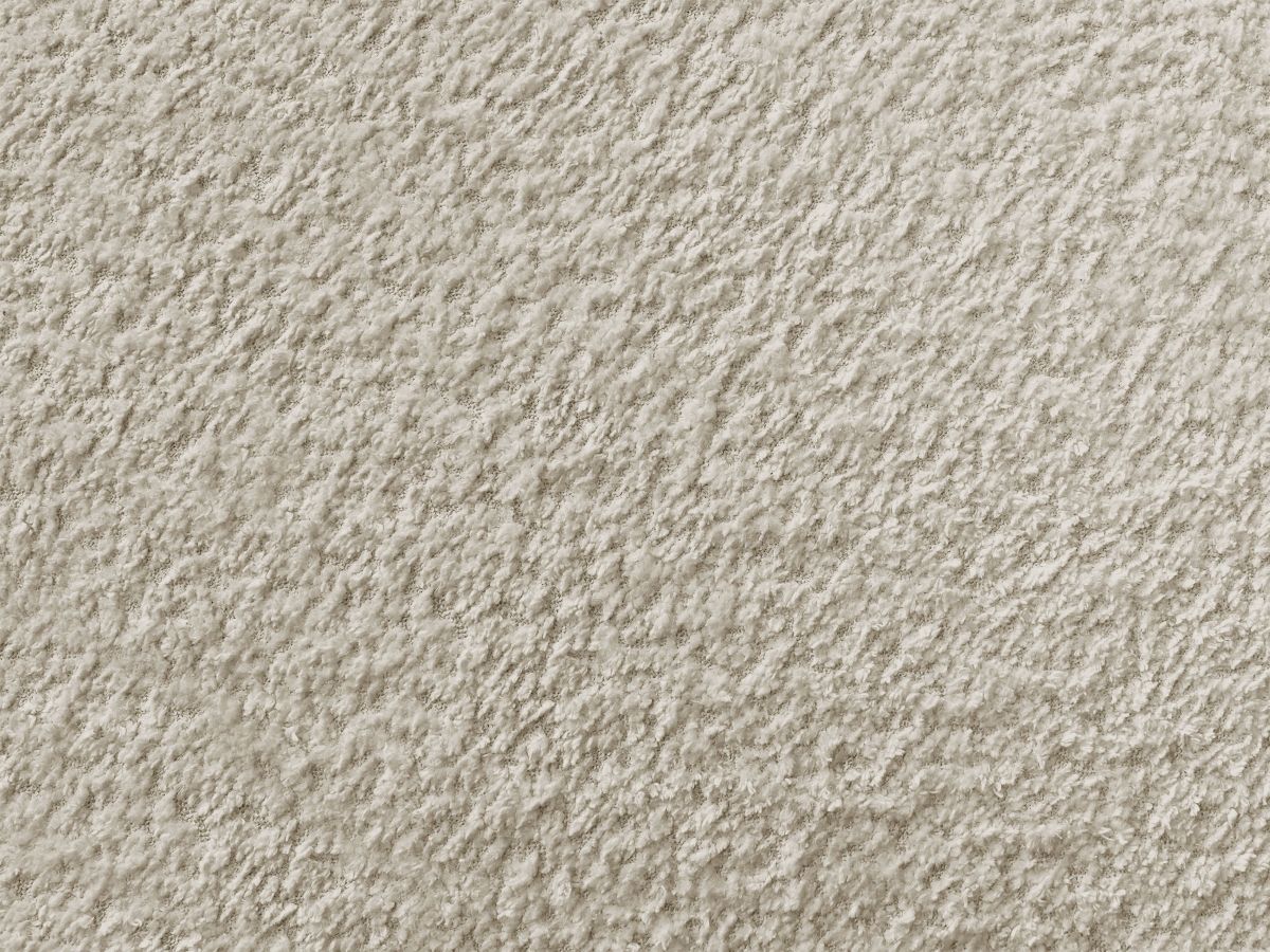 Canapé d'angle L convertible FUJI tissu bouclette avec pouf