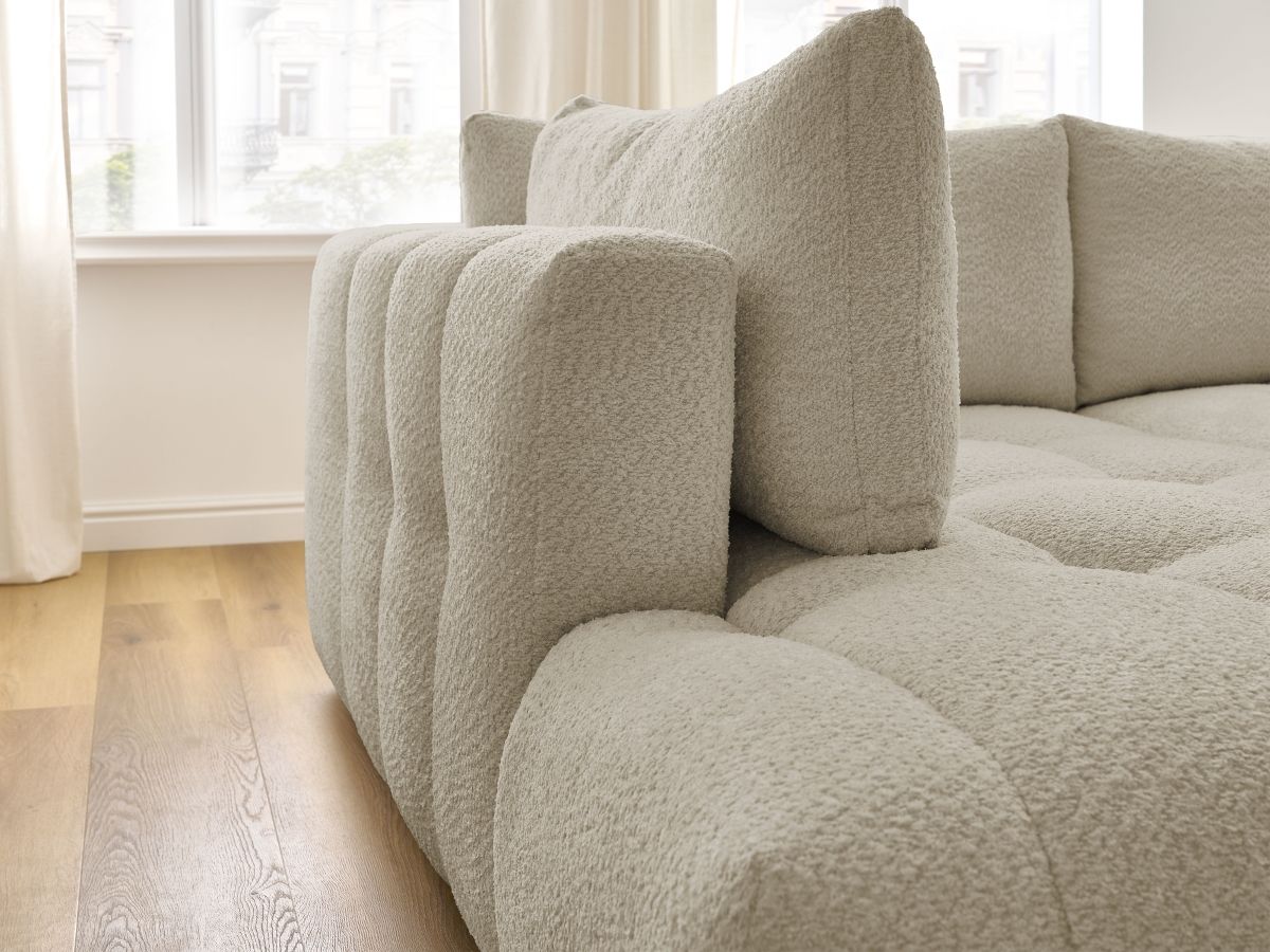 Canapé d'angle L convertible FUJI tissu bouclette avec pouf