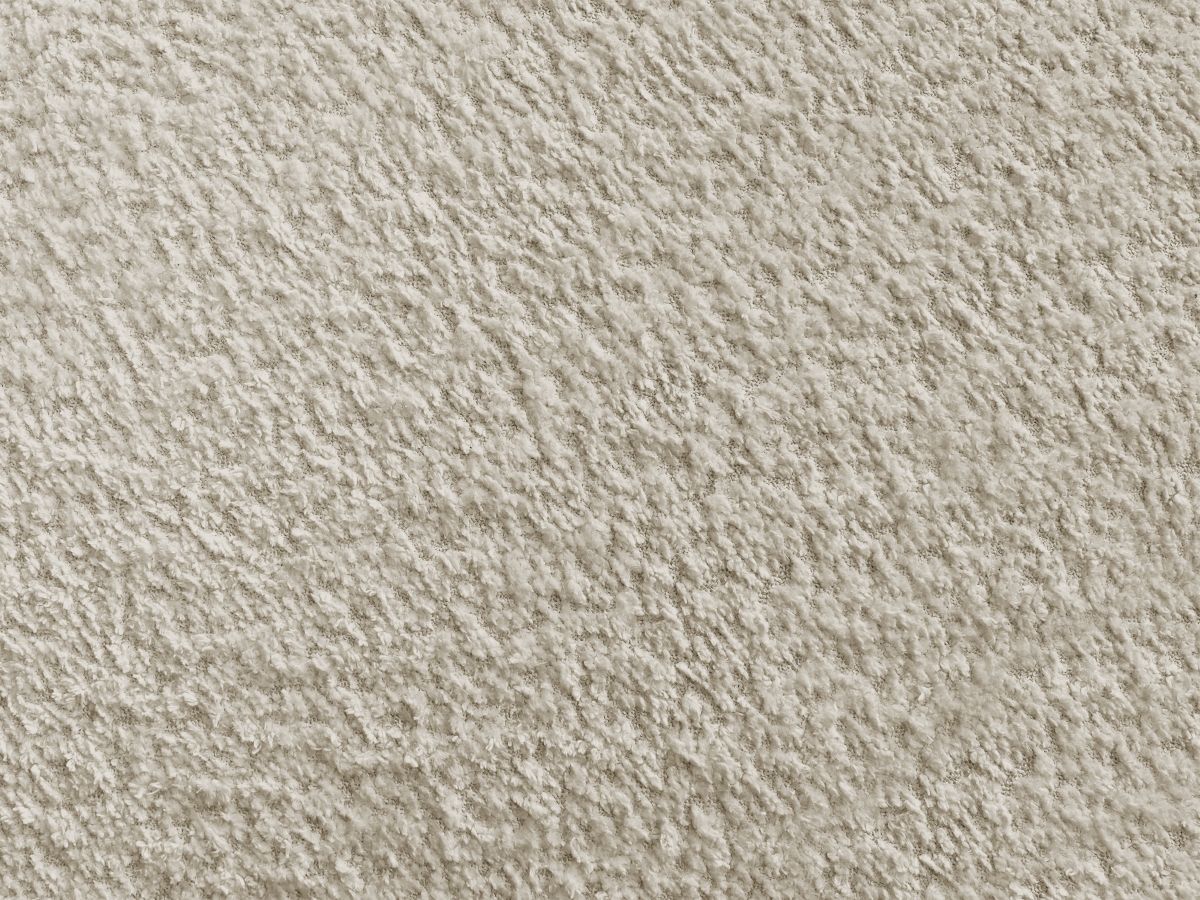Canapé d'angle L convertible FUJI tissu bouclette avec pouf