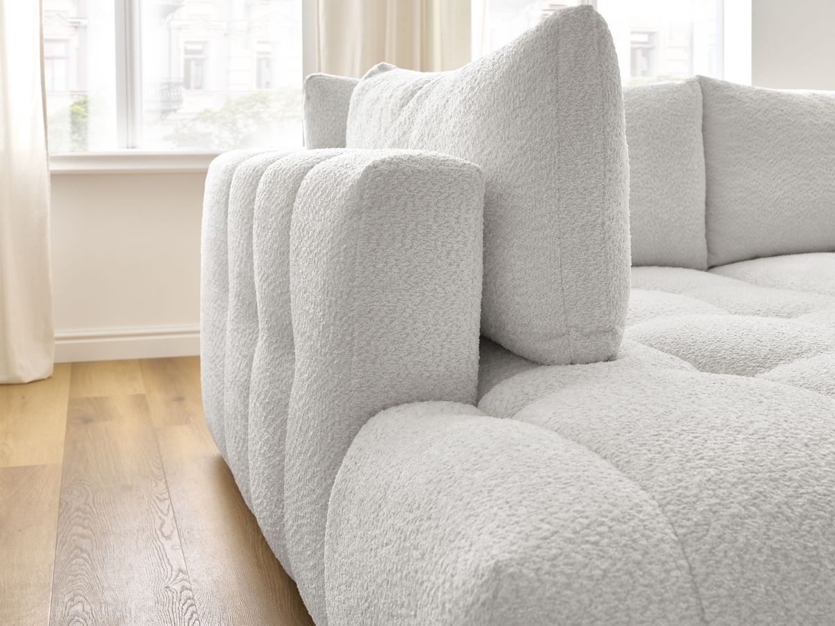 Canapé d'angle L convertible FUJI tissu bouclette avec pouf