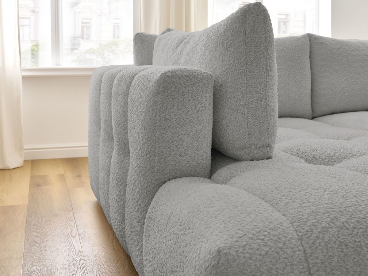 Canapé d'angle L convertible FUJI tissu bouclette avec pouf