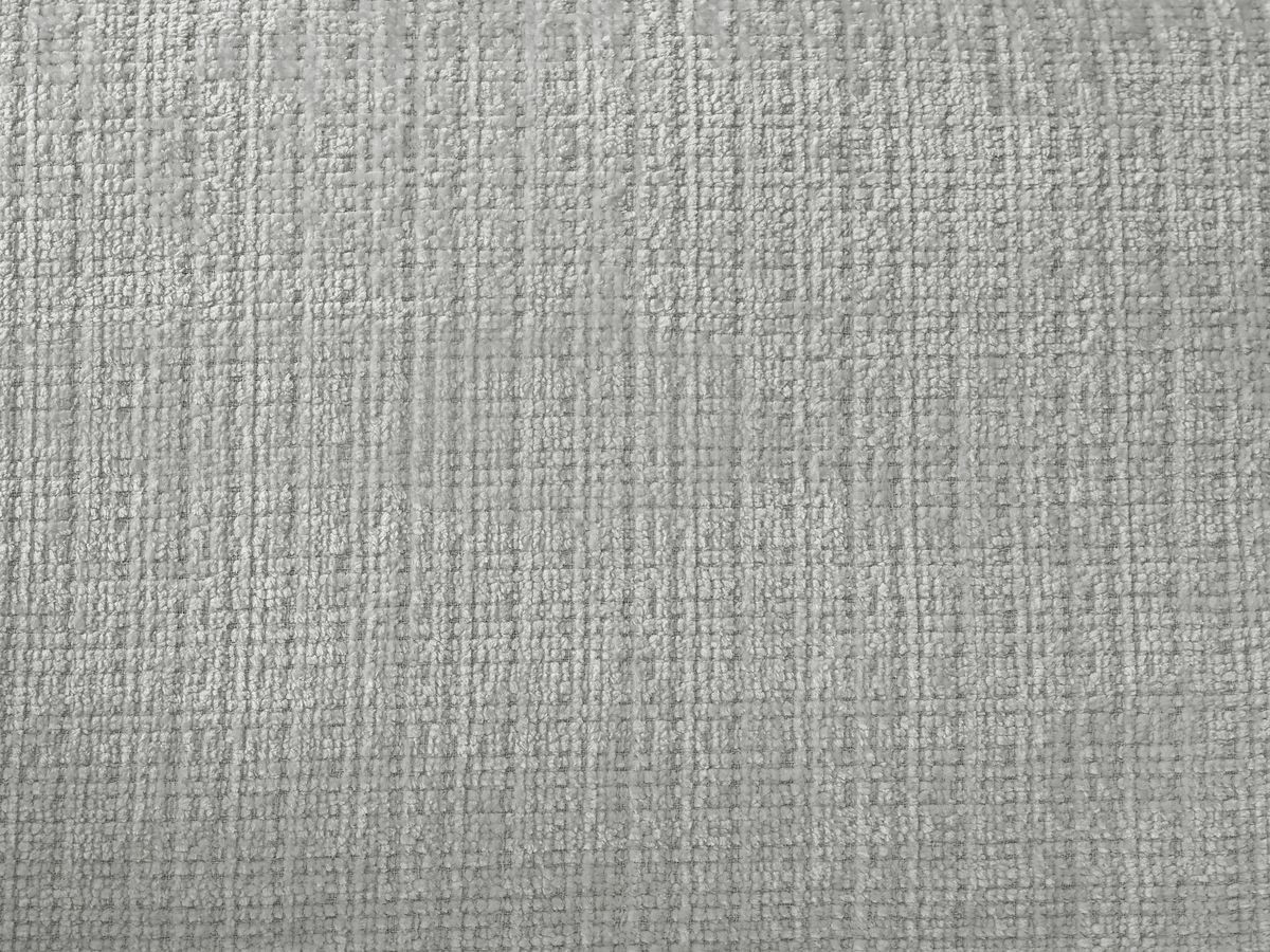 Canapé d'angle fixe IVANE tissu texturé avec pouf