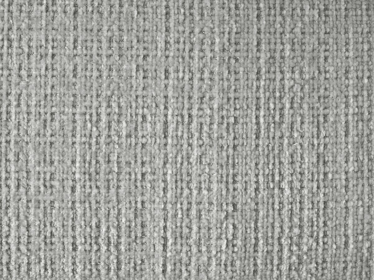 Canapé d'angle fixe IVANE tissu texturé avec pouf