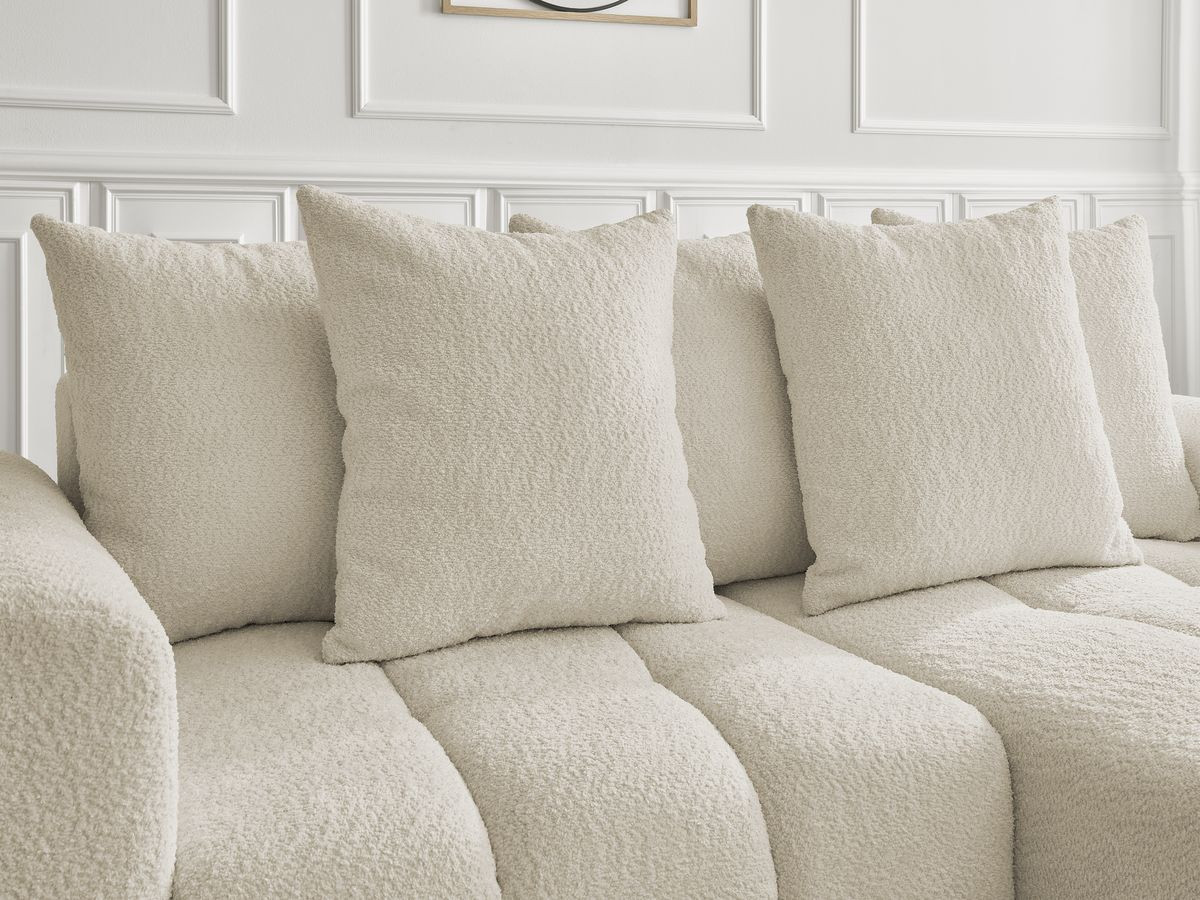 Canapé d'angle convertible coffre ROXELANE tissu bouclette avec pouf