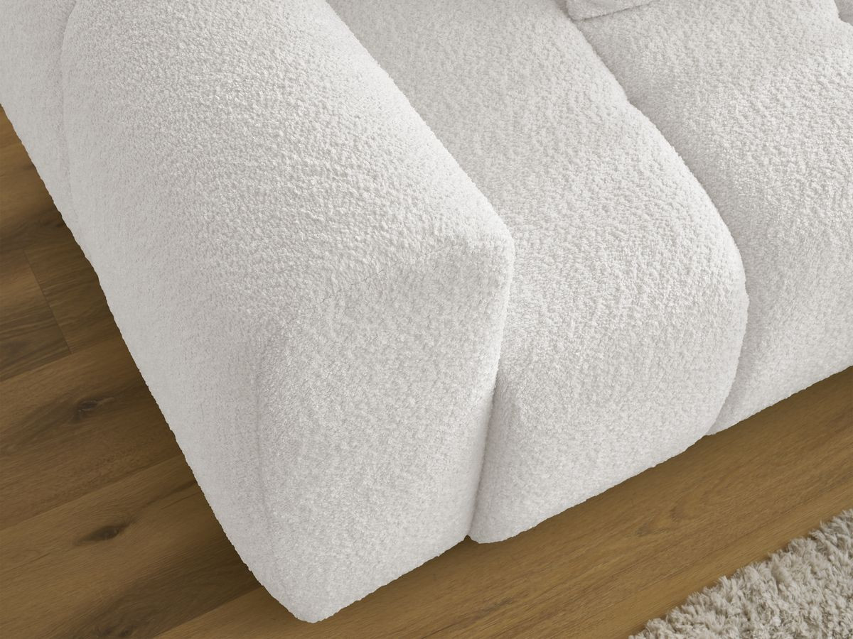 Canapé d'angle convertible coffre ROXELANE tissu bouclette avec pouf