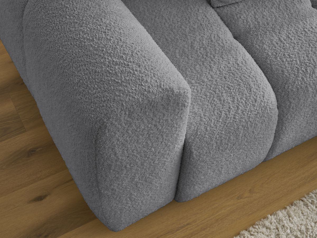 Canapé d'angle convertible coffre ROXELANE tissu bouclette avec pouf