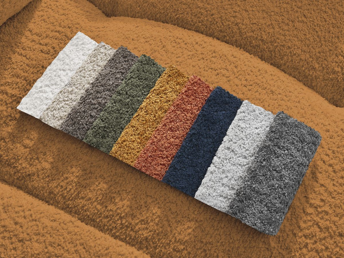 Canapé d'angle convertible coffre ROXELANE tissu bouclette avec pouf