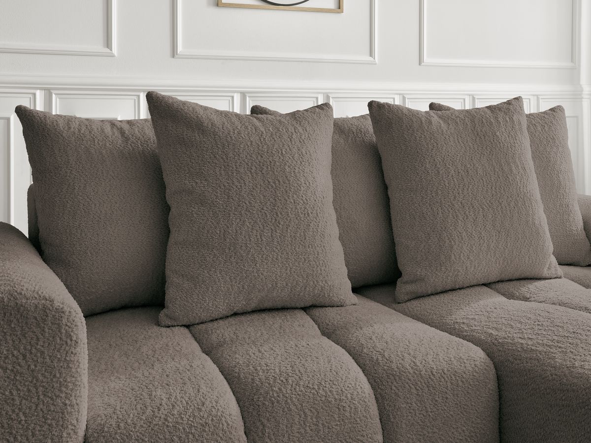 Canapé d'angle convertible coffre ROXELANE tissu bouclette avec pouf