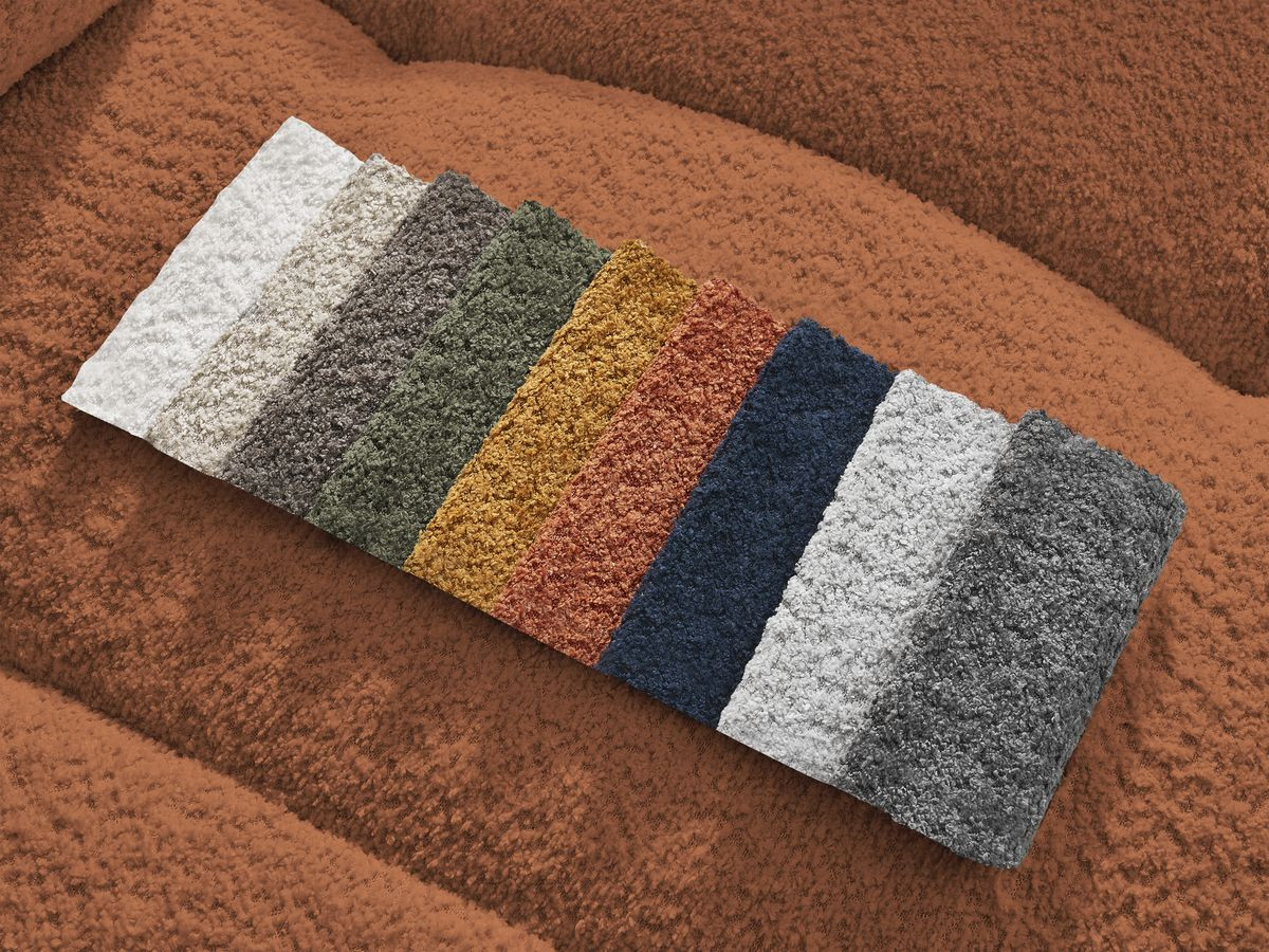 Canapé d'angle convertible coffre ROXELANE tissu bouclette avec pouf