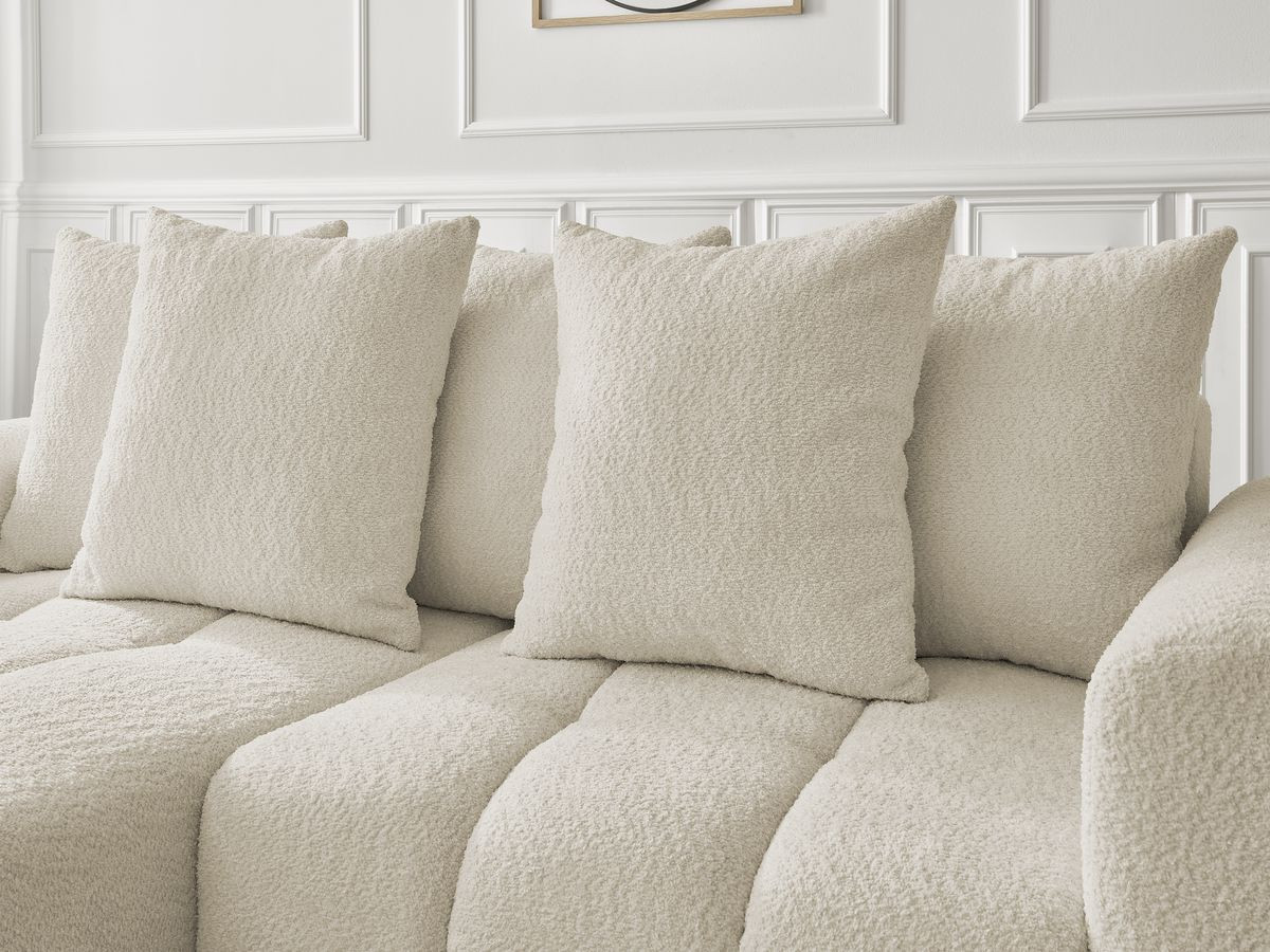 Canapé d'angle convertible coffre ROXELANE tissu bouclette avec pouf