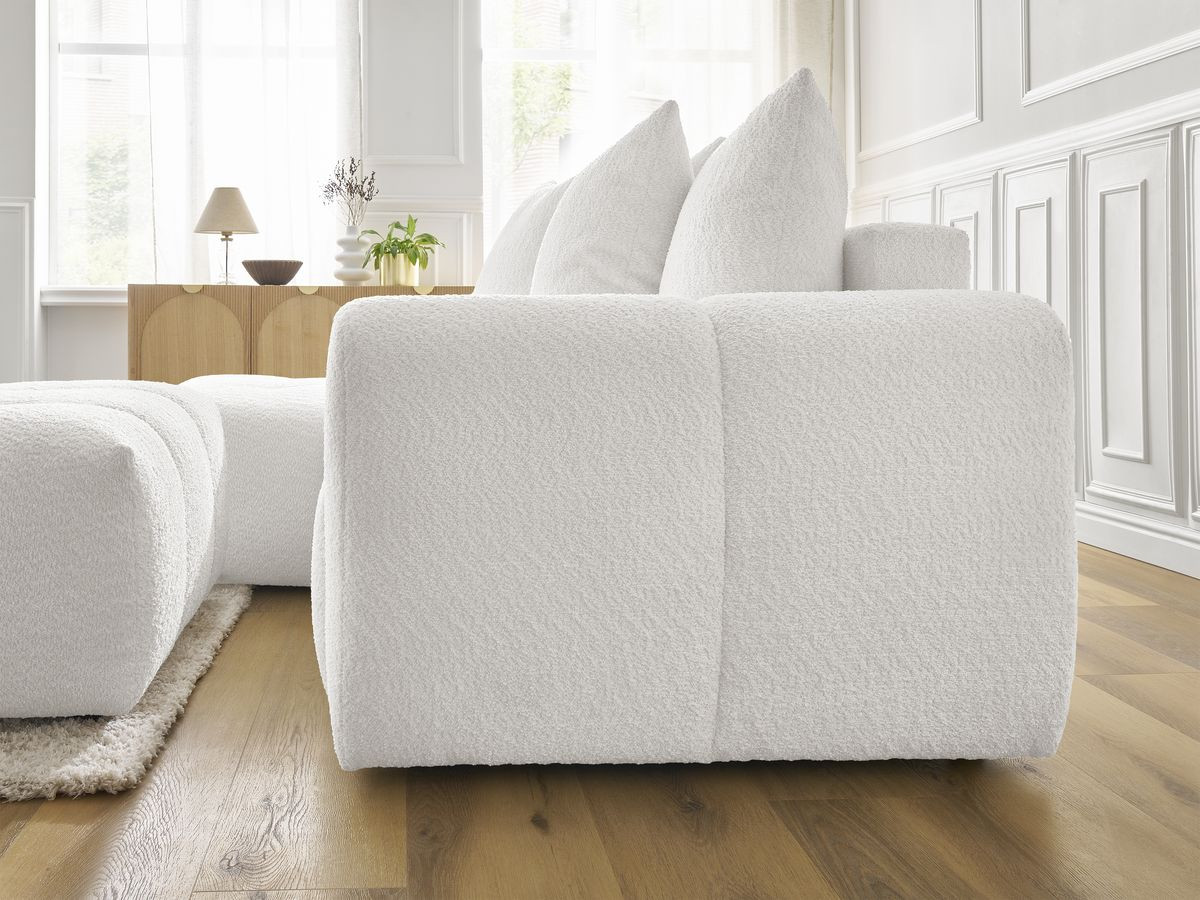Canapé d'angle convertible coffre ROXELANE tissu bouclette avec pouf