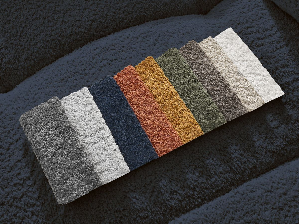 Canapé d'angle convertible coffre ROXELANE tissu bouclette avec pouf